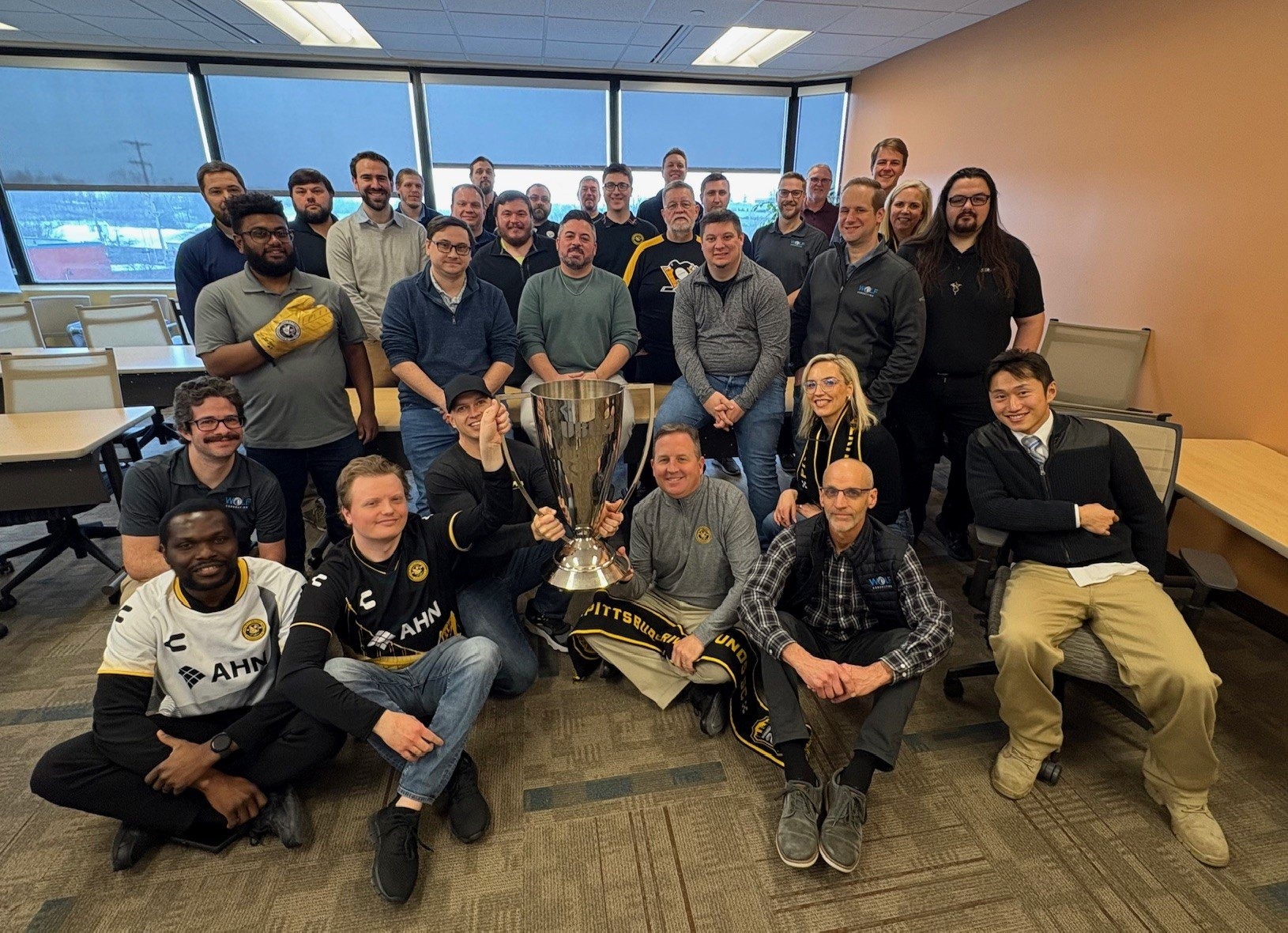 The full Wolf Consulting team gathered together at the Pittsburgh office