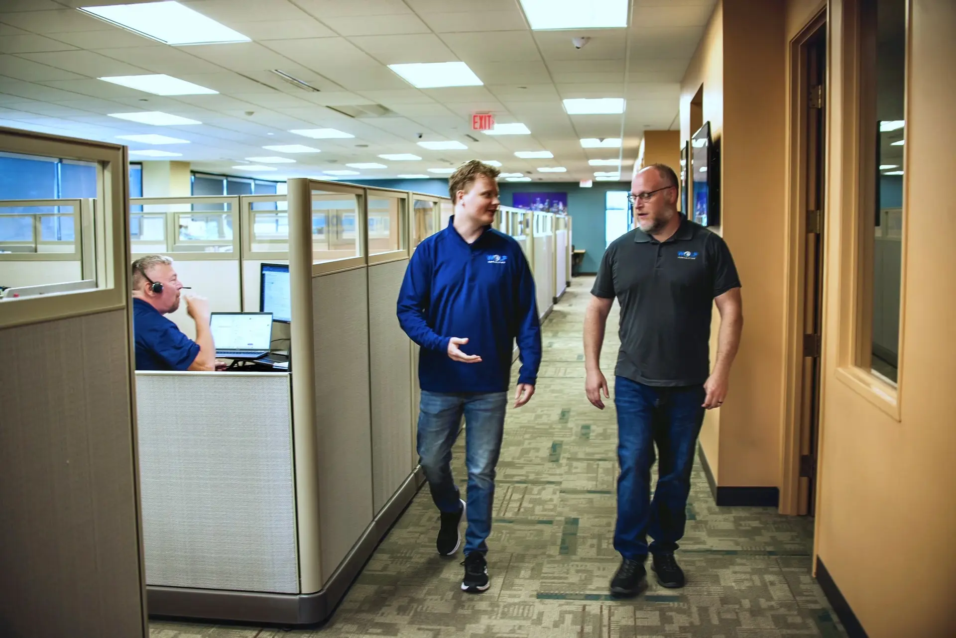 Wolf Consulting team walking the production facility floor